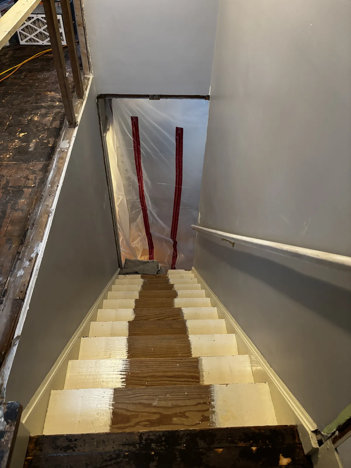 Staircase demolition with dust barrier